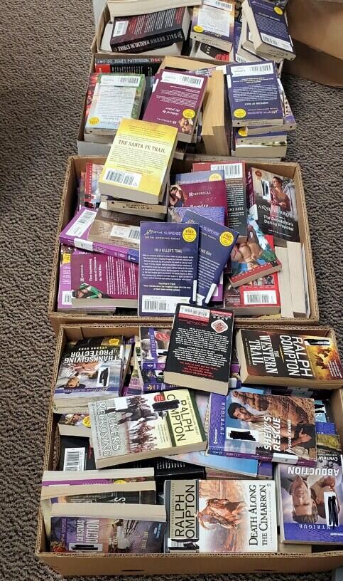 Image of box filled with books. 