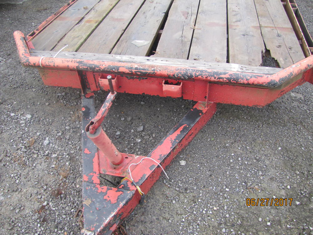 Red flat bed trailer.