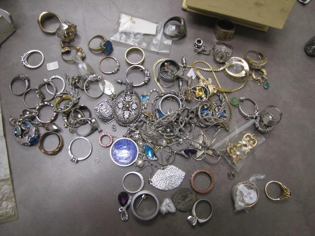 Several silver and gold rings.