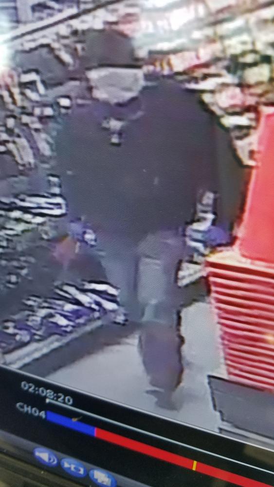 Image of side view of potential burglar. 